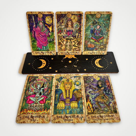 Fantasy World Tarot cards on a wooden stand: The Magician, The High Priestess, The Fool, The Empress, The Emperor, The Hierophant