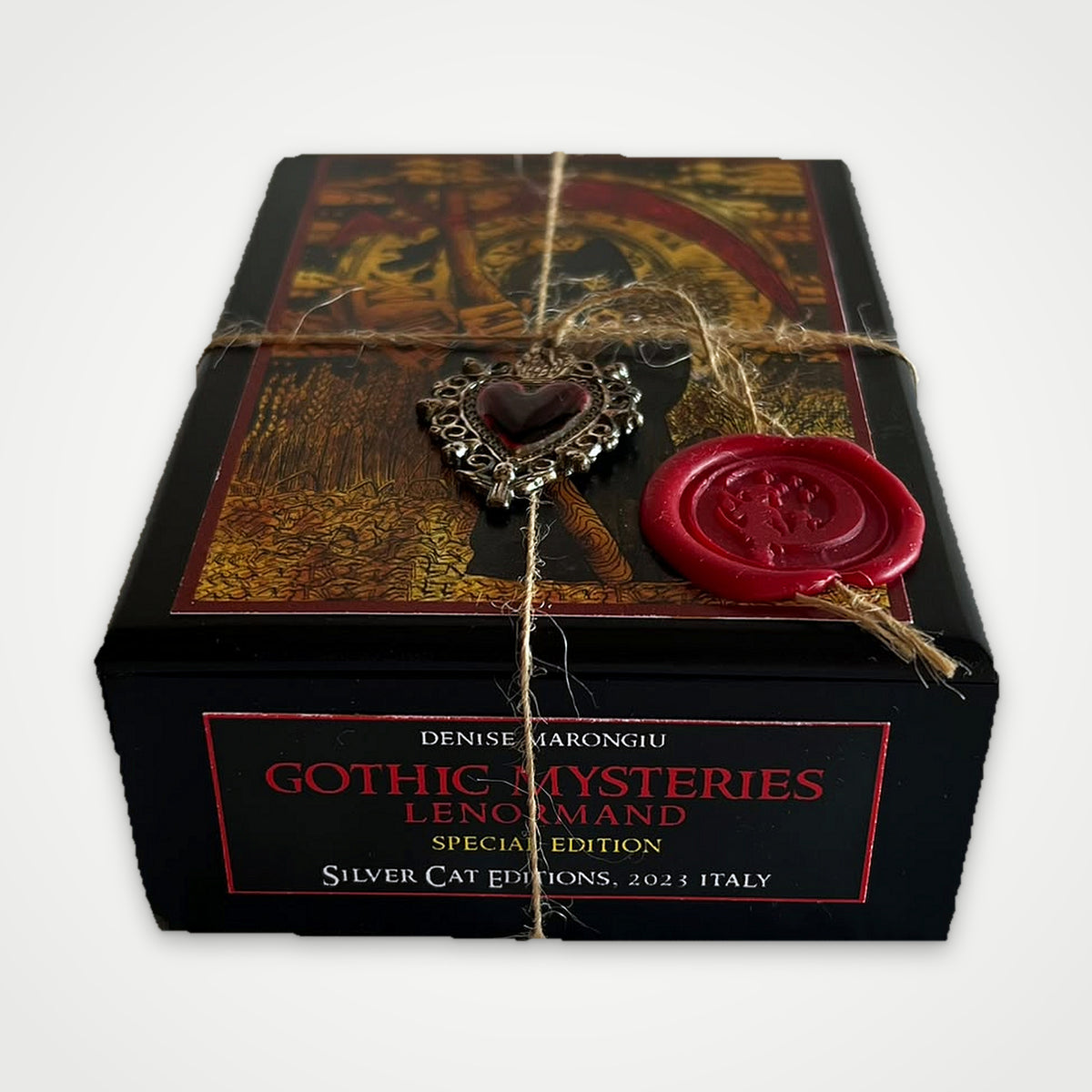 Black wooden box with the Gothic Mysteries Lenormand Special Edition label by Silver Cat Editions