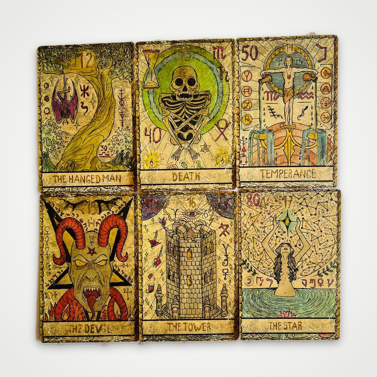 Samiramay Tarot Major Arcana cards: The Hanged Man, Death, Temperance, The Devil, The Tower, The Star